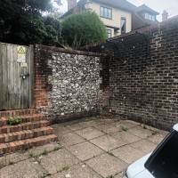 Outdoor Gym - Lewes - Wall mounted pull up bar on side of garrage